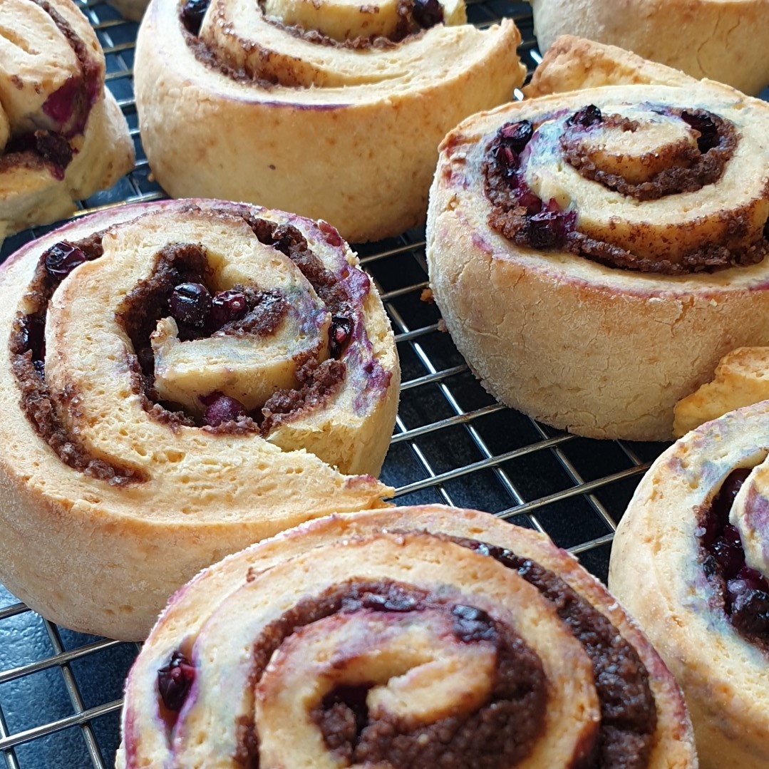 Elderberry Chelsea Buns baked, ready to ice